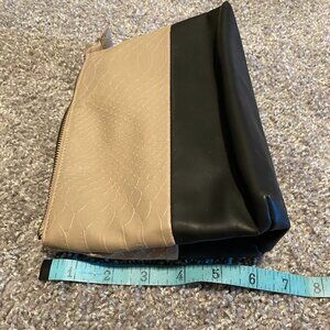 Wassio small zipper bag. Used once. No straps. Black and Tan.